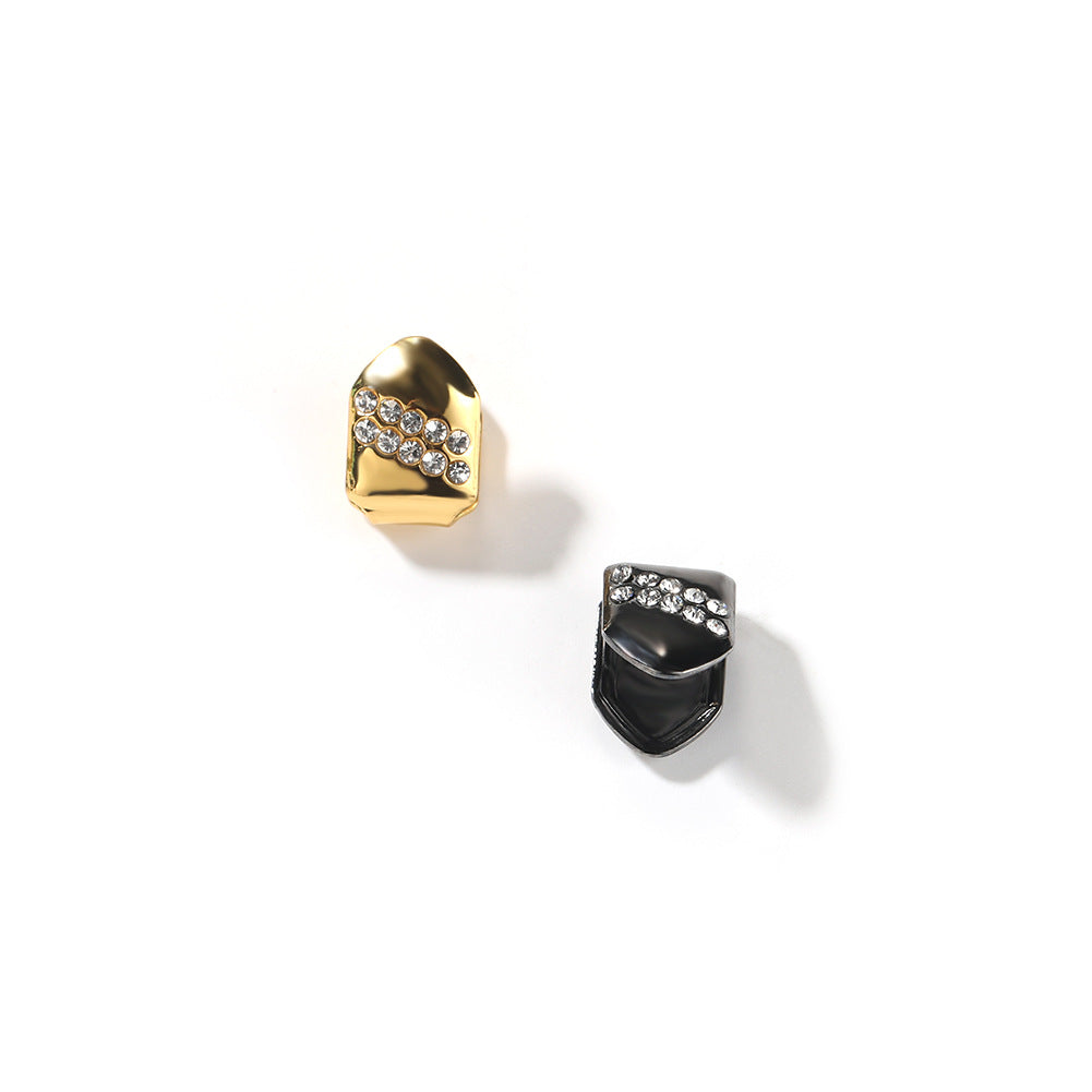 Hip-hop diamond-encrusted and gold-plated teeth grillz