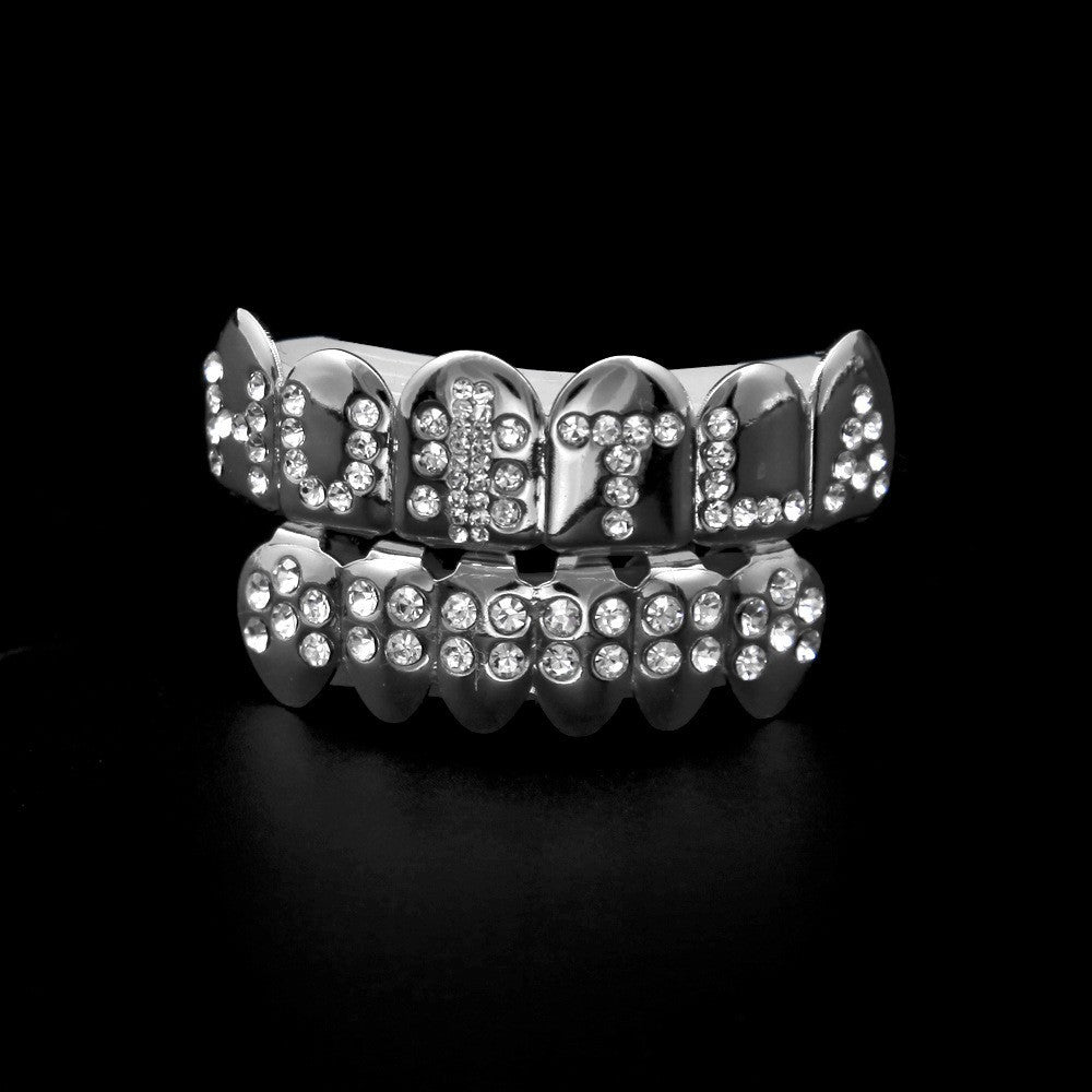 Hip-hop diamond-encrusted and gold-plated teeth grillz